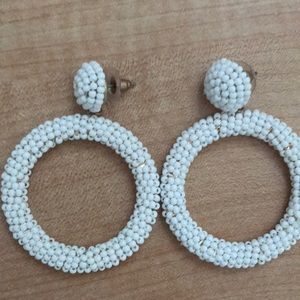 Brand new, never worn white earrings